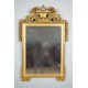 Miroir Louis XVI bois doré à fronton XVIIIe siècle